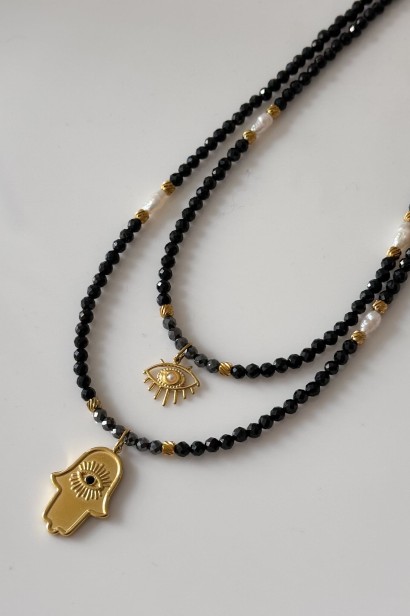 naszyjnik hamsa, naszyjnik oko proroka, czarny turmalin naszyjnik, biżuteria ochronna, naszyjnik z perełkami, naszyjnik ze stali szlachetnej, naszyjnik z hematytem, talizman ochronny, biżuteria Lulobelia
