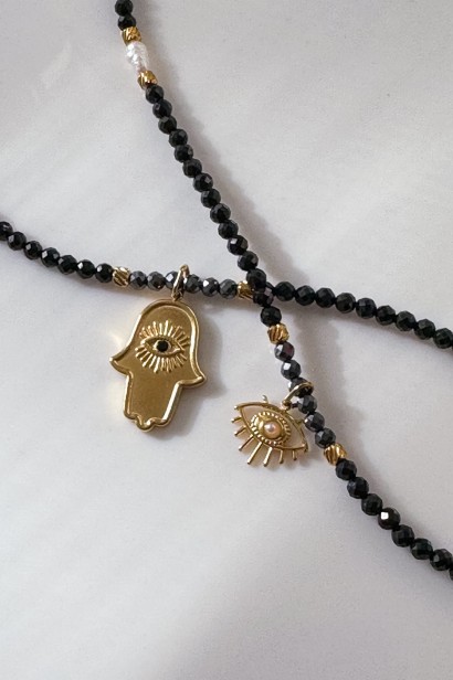 naszyjnik hamsa, naszyjnik oko proroka, czarny turmalin naszyjnik, biżuteria ochronna, naszyjnik z perełkami, naszyjnik ze stali szlachetnej, naszyjnik z hematytem, talizman ochronny, biżuteria Lulobelia