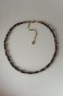 Choker z czarnego turmalinu Lulobelia na szyi, krótki naszyjnik amulet ochronny, biżuteria autorska handmade Polska