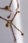 Naszyjnik Lulobelia amulet miłości, złote słońce, ornamentowy kwiat, różowe szkiełka w oprawie, biżuteria autorska Polska